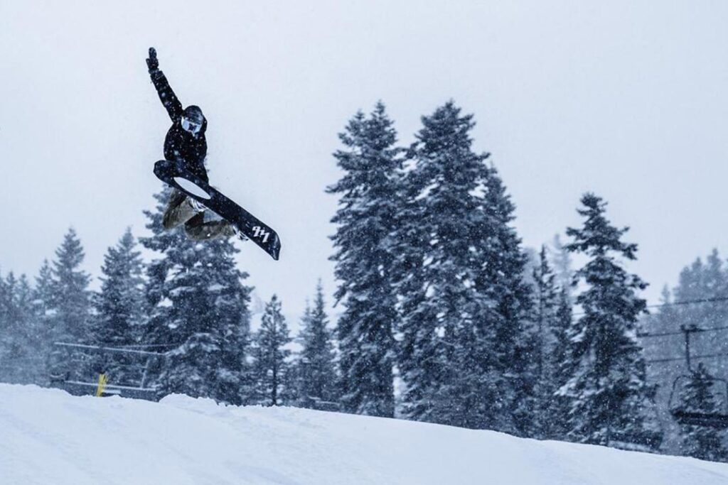 Snowboarder jumping at Boreal CA