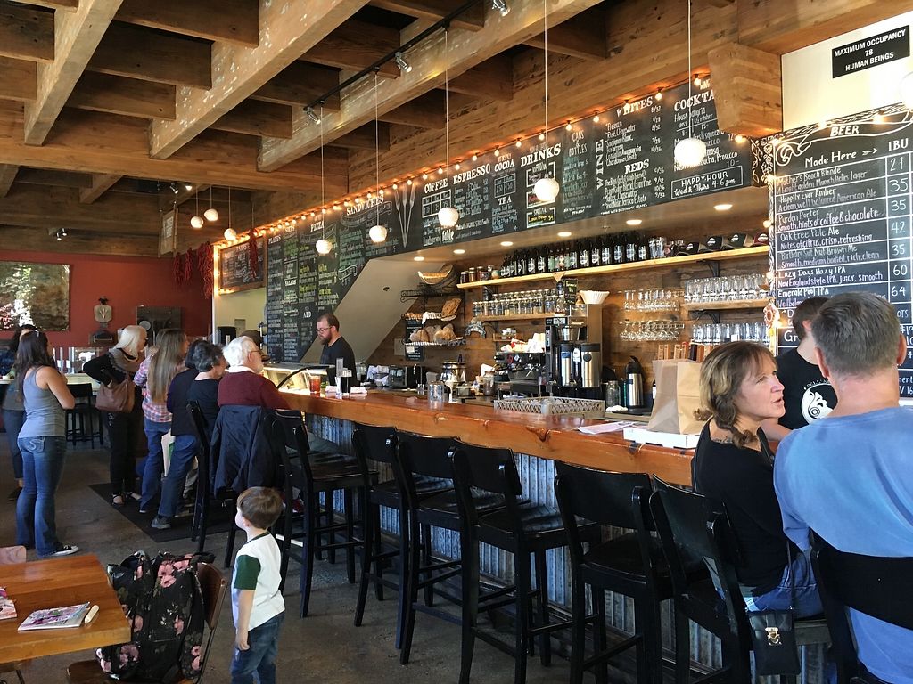 People at the counter at Three Forks, Nevada City